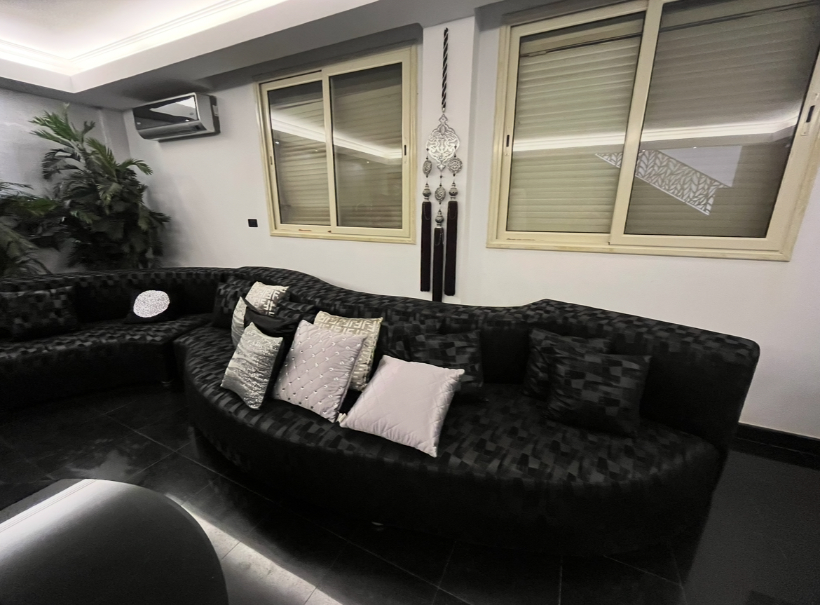 Black S Shape Sofa thumbnail