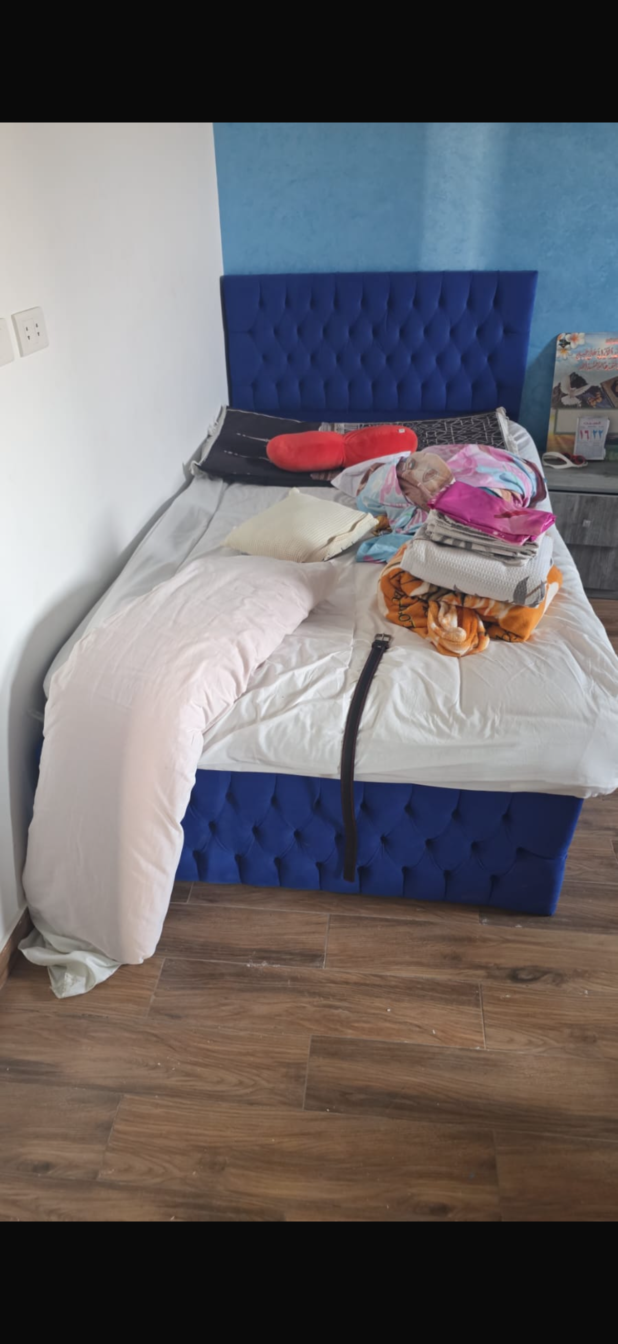 Bed with wardrobe